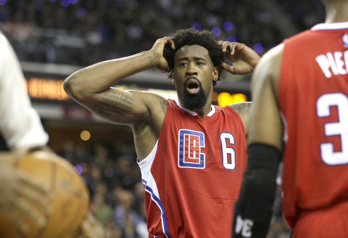 Clippers center DeAndre Jordan reacts after being called for a foul during the second half of the game against the Kings.
