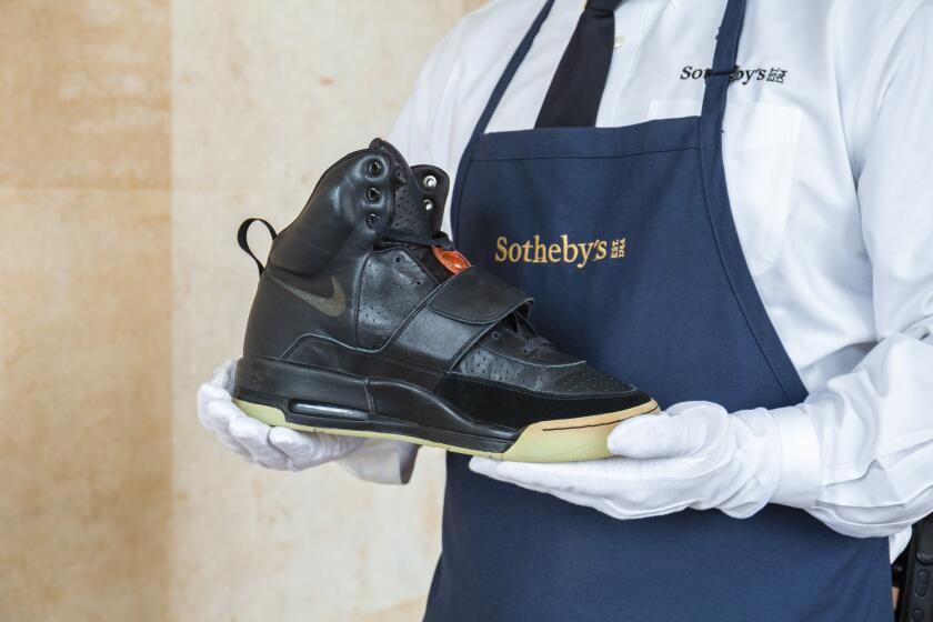 A photo of the Kanye West 'Grammy Worn' Nike Air Yeezy Sample that will be presented at the Hong Kong Convention Center April 16th. Credit: Sotheby's
