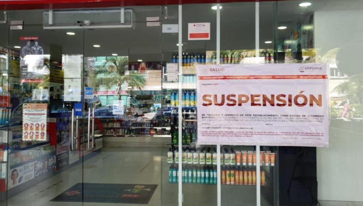 Mexican authorities posted this image of a pharmacy where services were suspended in Quintana Roo.