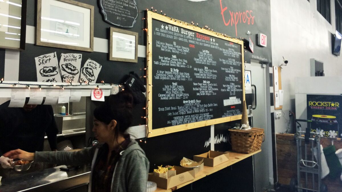 Stephanie Paramo takes orders at Vaka Burger in Boyle Heights.