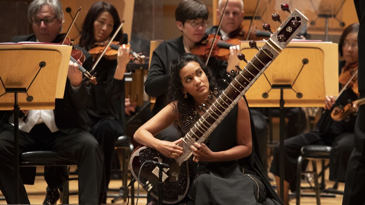 Soloist Anoushka Shankar performs Sitar Concerto No. 3 with the Pacific Symphony, conducted by Carl St.Clair, Thursday at the Renee and Henry Segerstrom Concert Hall in Costa Mesa.