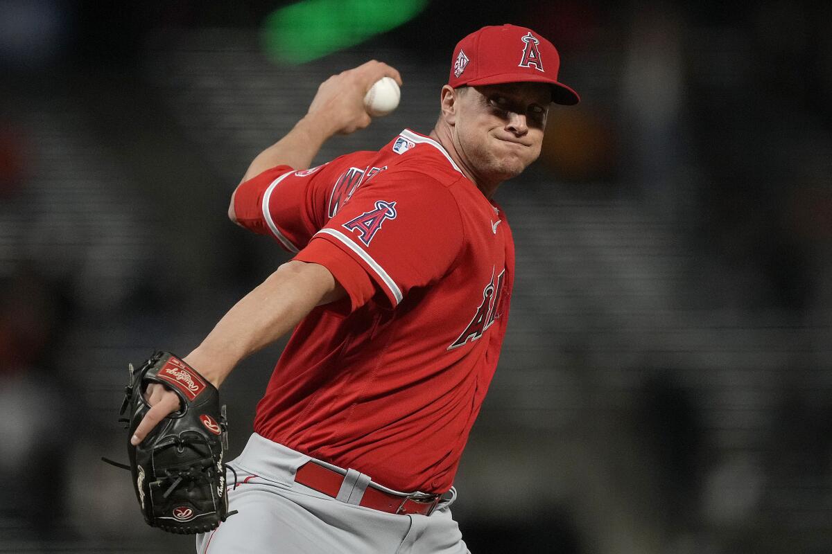 Los Angeles Angels pitcher Tony Watson throws to a San Francisco Giants batter 