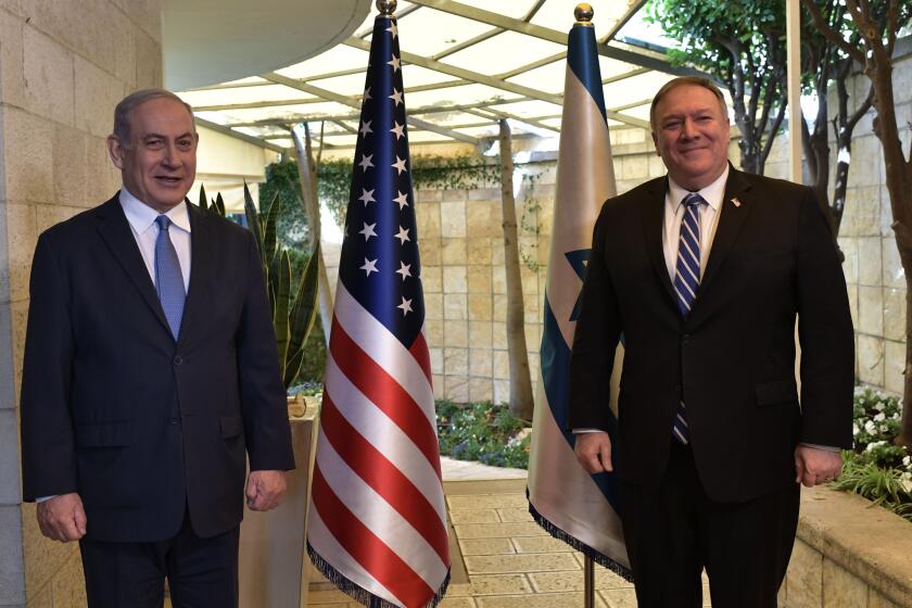 JERUSALEM, ISRAEL - MAY 13: (ISRAEL OUT) In this handout photo provided by the Israel Government Press Office (GPO), Israeli Prime Minister Benjamin Netanyahu (L) meets with US Secretary of State Mike Pompeo on May 13, 2020 in Jerusalem, Israel. The US secretary of state is visiting Jerusalem to attend key meetings as Israel prepares to swear in a new government with a rotating premiership. This is the first visit by a senior diplomatic figure since the peak of the coronavirus outbreak. (Photo by Kobi Gideon/GPO via getty Images)