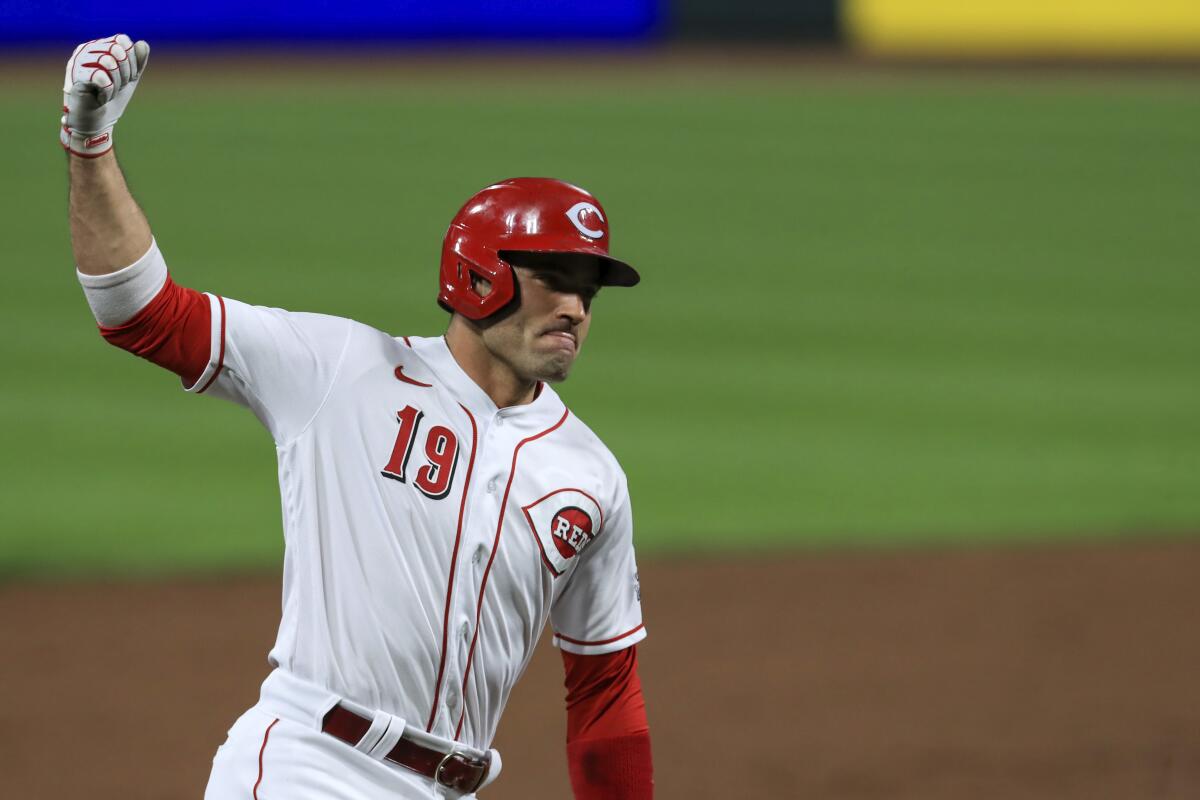 Cincinnati Reds' Joey Votto runs the bases after hitting a home run against the Pittsburgh Pirates on Sept. 14.