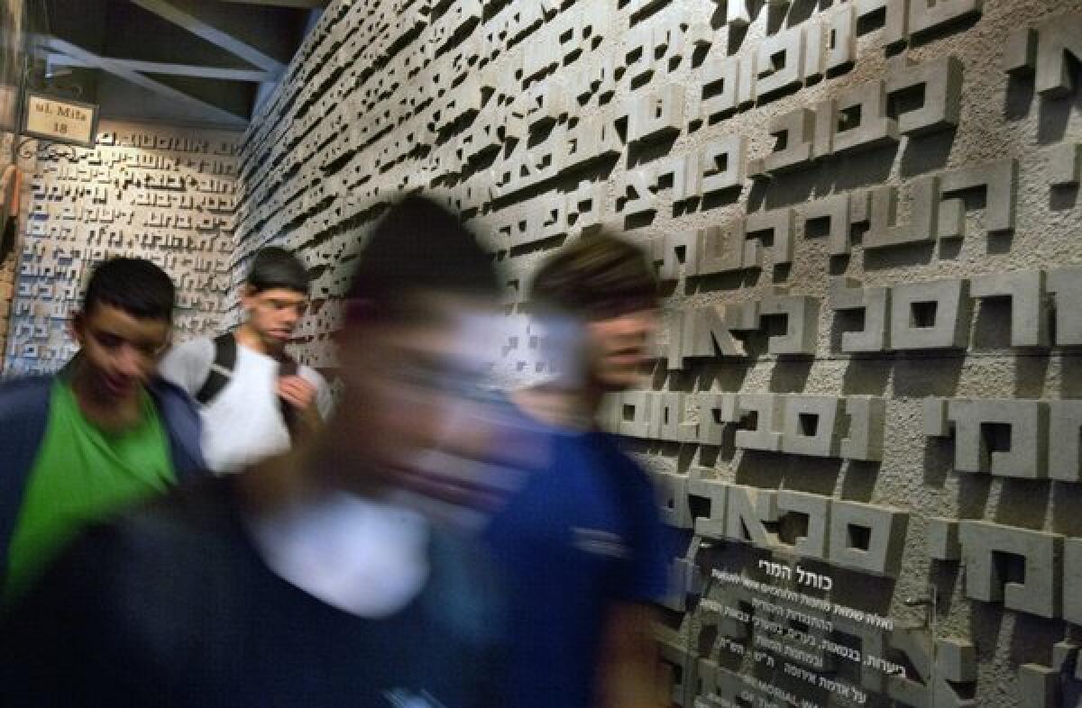 Israeli schoolchildren visit the Holocaust Museum in Kibbutz Yad Mordechai as part of Holocaust Remembrance Day.