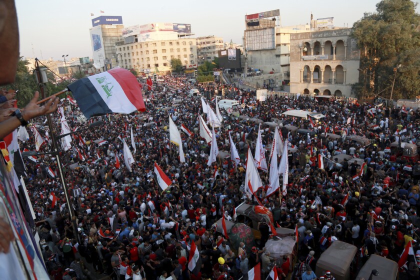 Antigovernment protesters gather in Baghdad's Tahrir Square on Friday.