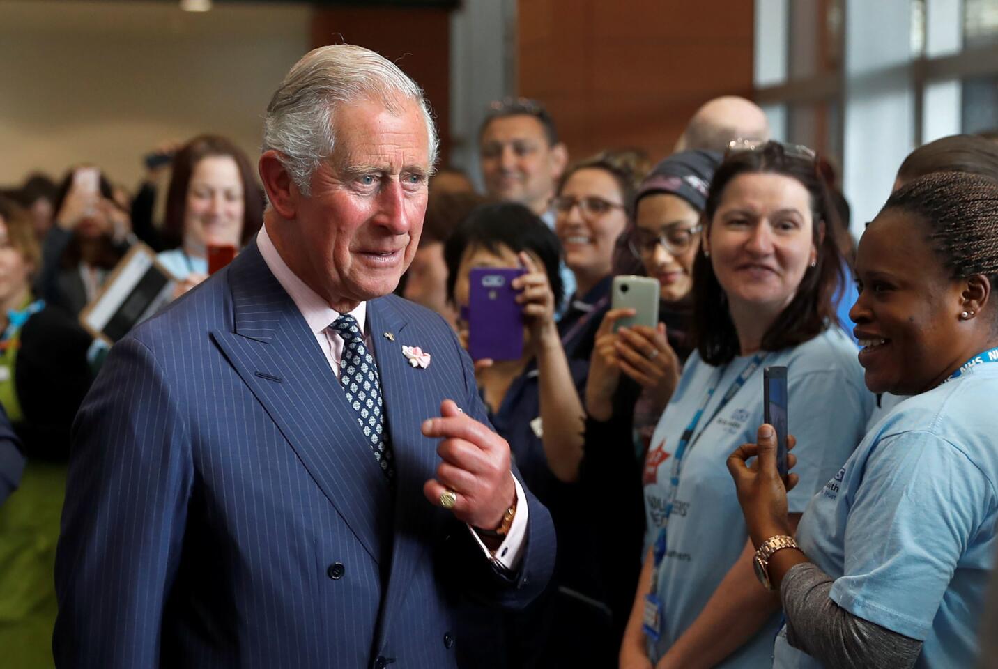 Charles, Prince of Wales, talks to staff during a visit to the Royal London Hospital on Tuesday, following the Saturday night terrorist attack in London.