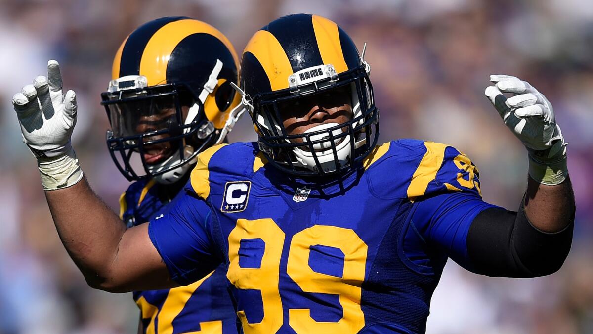Rams defensive tackle Aaron Donald (99) is seeking a new contract that would make him one of the highest-paid defensive players in the NFL.
