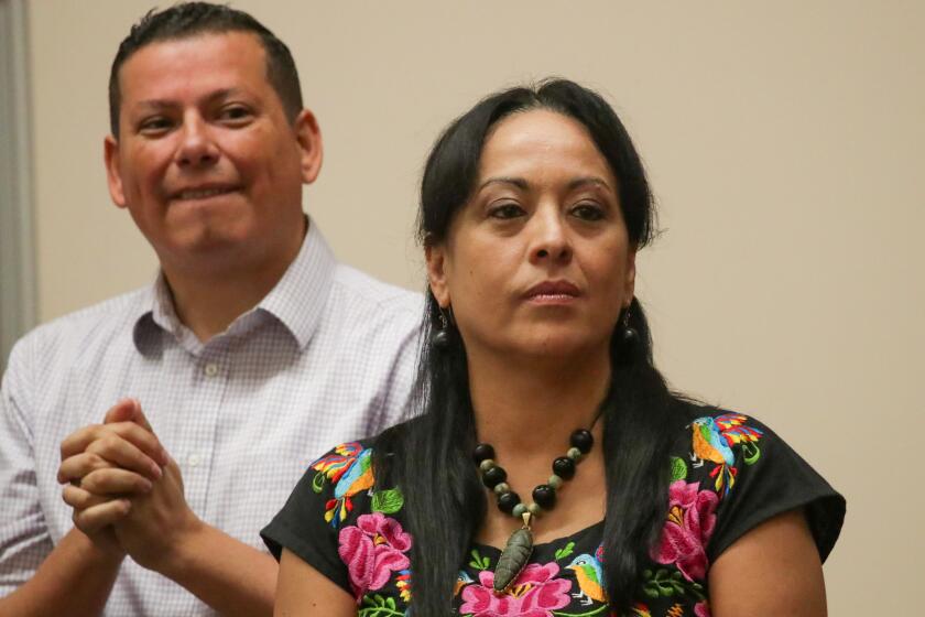 Bakersfield, CA - October 22: Kern county supervisor Leticia Perez, right, running for state assembly at a campaign event held for assemblyman Rudy Salas, left, running against incumbent Rep. David Valadao for the newly drawn congressional district 22, at IBEW Local 428 on Saturday, Oct. 22, 2022 in Bakersfield, CA. (Irfan Khan / Los Angeles Times)