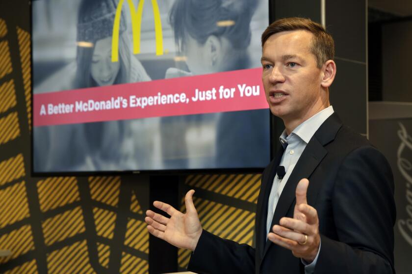 FILE - Chris Kempczinski, then-incoming president of McDonald's USA, speaks during a presentation at a McDonald's restaurant in New York on Nov. 17, 2016. Kempczinski will become chairman of the company's board later this spring, the company said Tuesday. (AP Photo/Richard Drew, File)