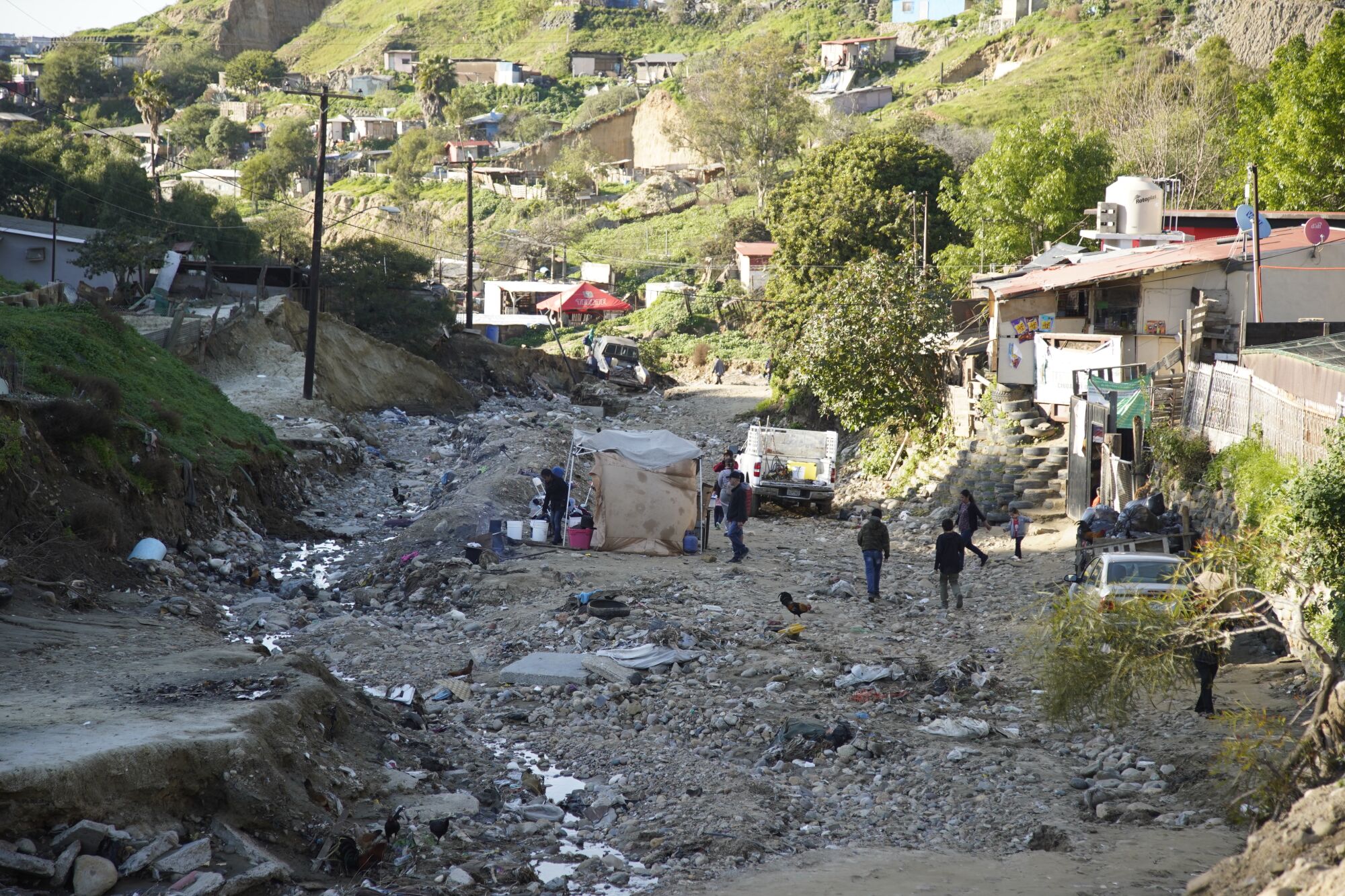 The road leading to the migrant shelter Templo Embajadores de Jesús was recently destroyed by rain.