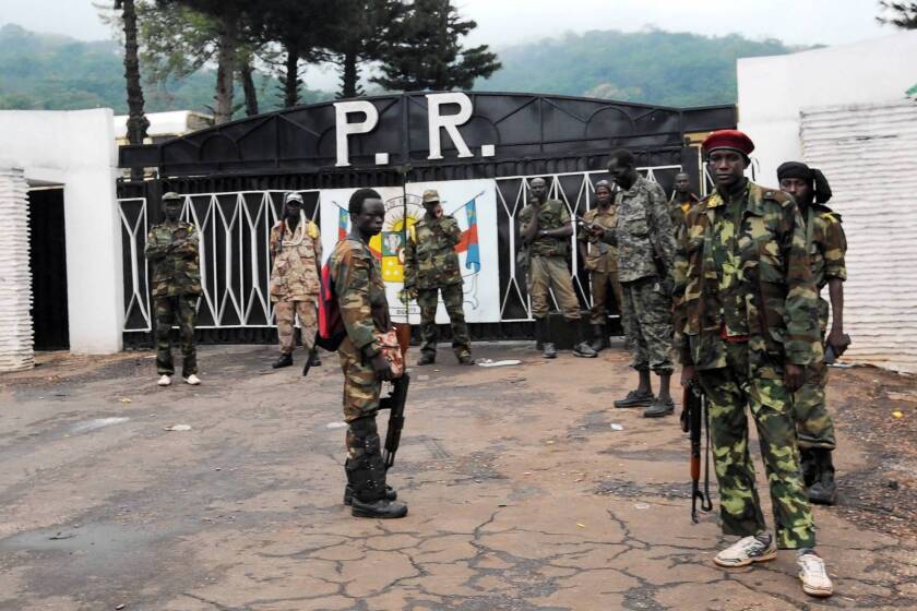 Rebel forces guard the presidential palace in Bangui, the capital of the Central African Republic, after seizing power.