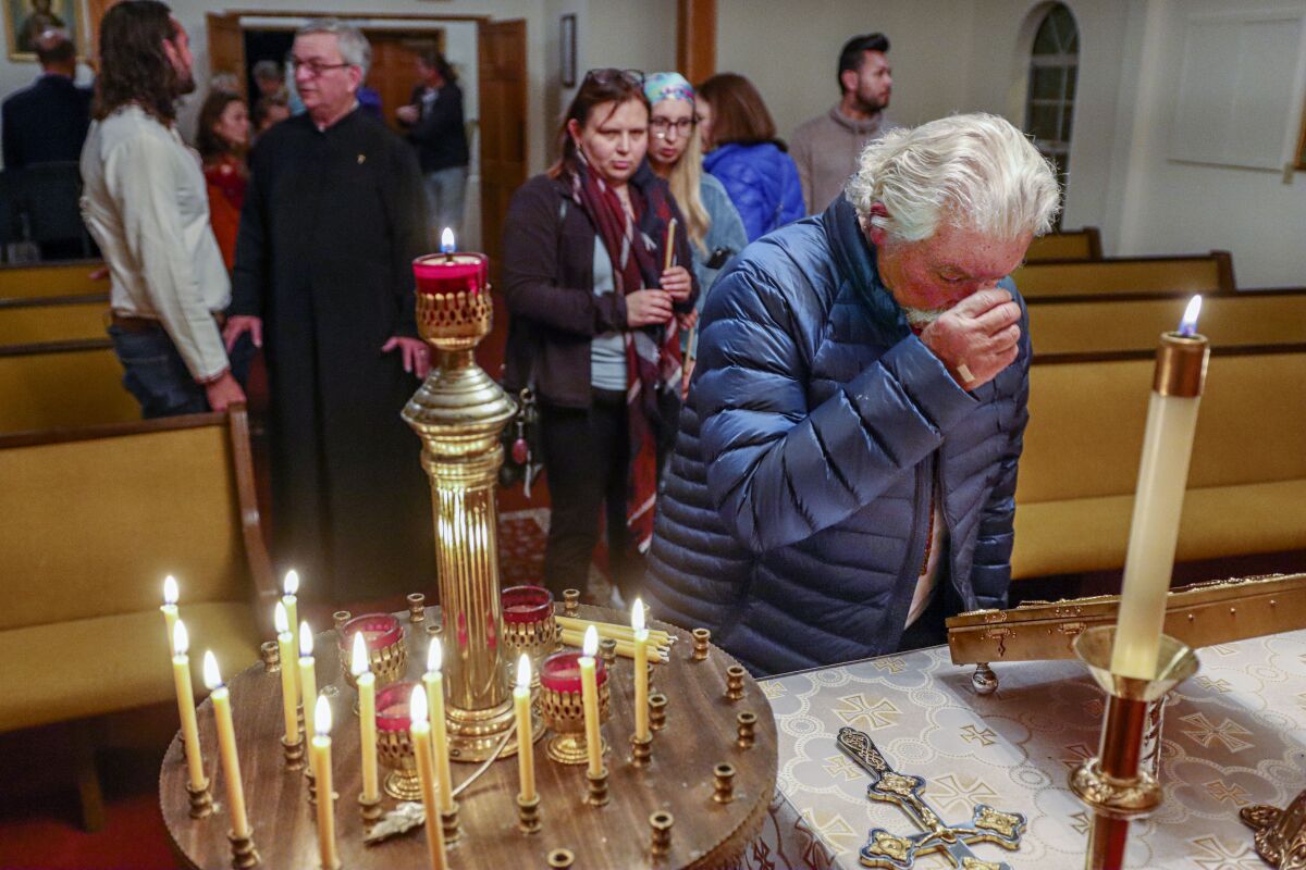 Congregants at St. Mary Protectress Ukrainian Orthodox Church in Spring Valley pray for war victims in Ukraine.