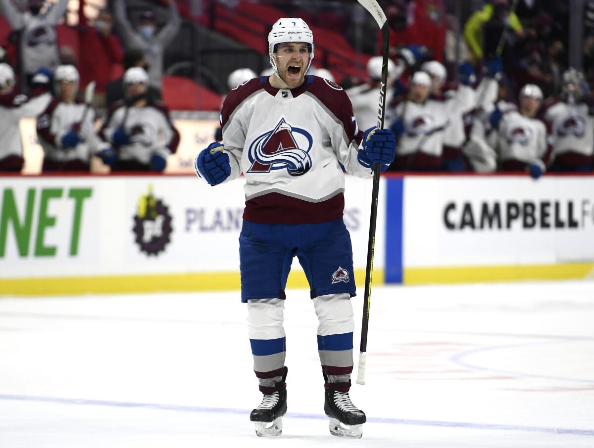 Colorado Avalanche defenceman Devon Toews celebrates his goal against the Ottawa Senators during the third period of an NHL hockey game Saturday, Dec. 4, 2021, in Ottawa, Ontario. (Justin Tang/The Canadian Press via AP)