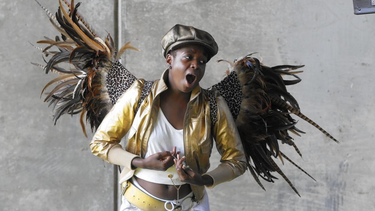 Quayla Bramble as Angel sings during "Hopscotch Opera," the mobile opera driving around town in Los Angeles, on Oct. 17, 2015.