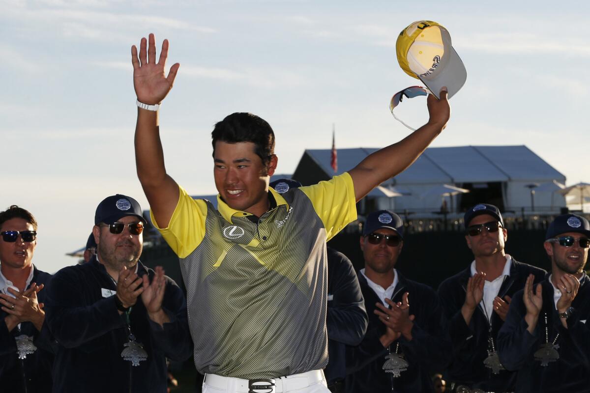 Hideki Matsuyama reacts after winning the Waste Management Phoenix Open in the final round at TPC Scottsdale.