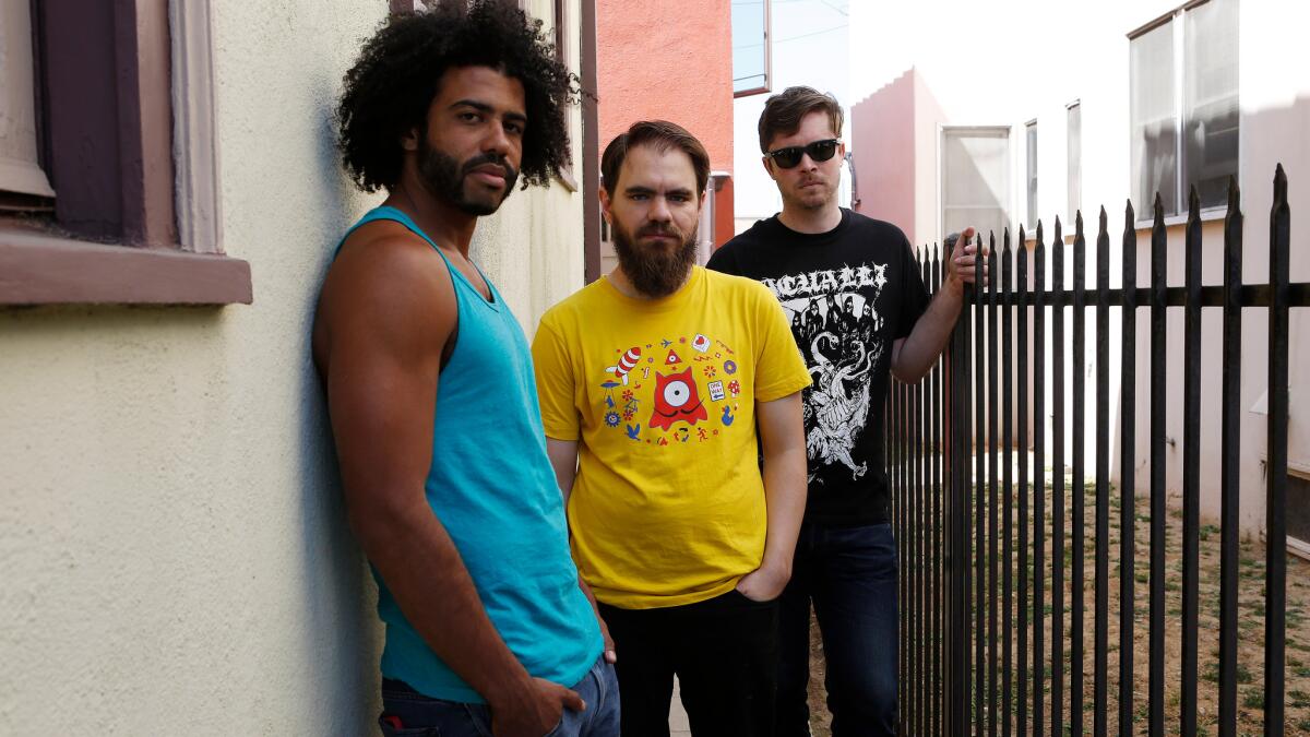 Daveed Diggs, left, Jonathan Snipes and William Hutson of L.A. rap group Clipping.