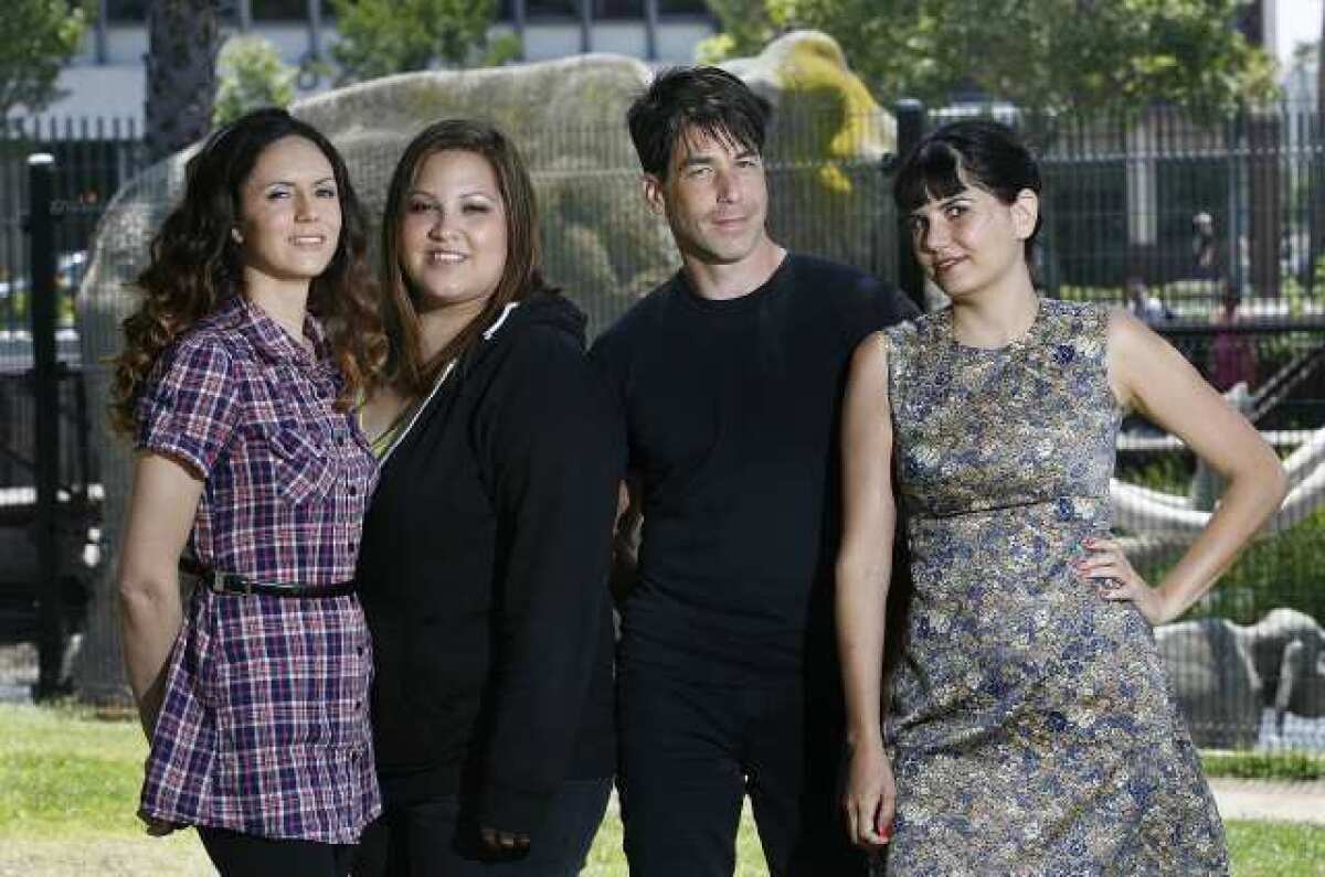 Aixa Vilar, Betty Cisneros, Phil Buckman, and Nicolette Vilar, the members of the band Go Betty Go in Los Angeles. The band formed at Glendale High School in 1999, and have recently reunited and will perform next week at Universal CityWalk.
