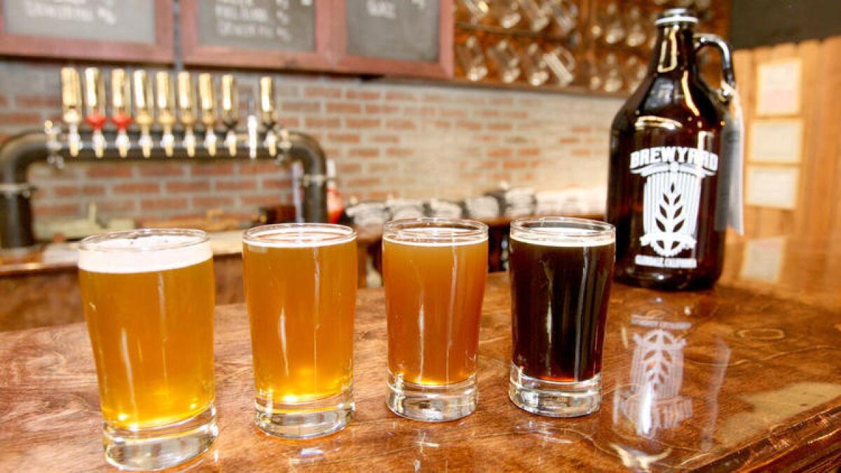 Brewyard Beer Co. beers, left to right, Tropico Saison, Split Shift IPL, Soul Cal Hoopy Cali Common and Black Sunrise lager, are showcased on Tuesday, Nov. 17, 2015. The brewery at 909 Western Ave. in Glendale is the first craft beer brewery to open within city limits.