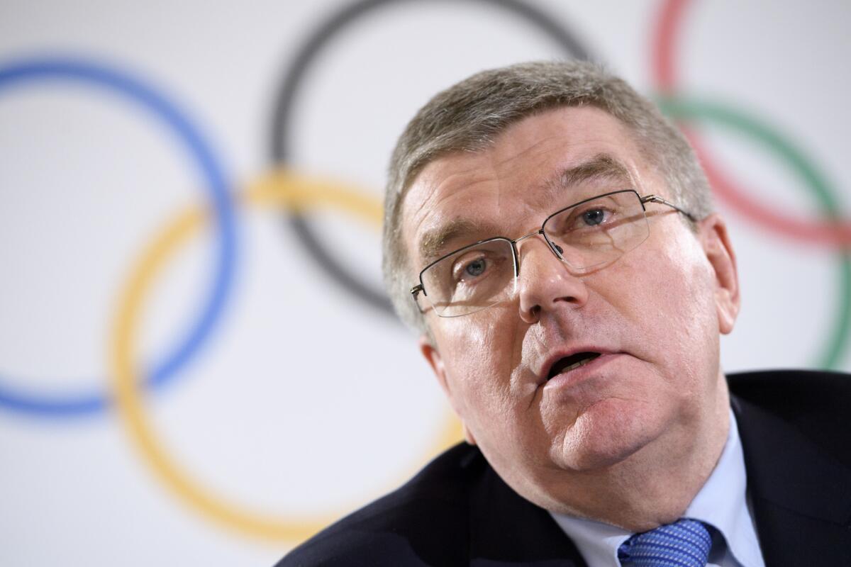 IOC President Thomas Bach speaks at a news conference in Lausanne, Switzerland, on Dec. 8.