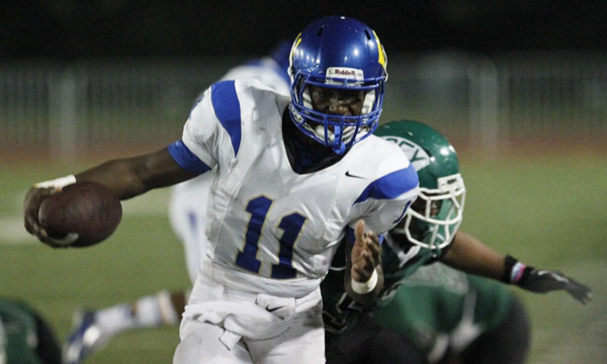 Crenshaw quarterback Ajene Harris will pose a defensive challenge for longtime rival Dorsey this week.