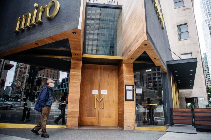 LOS ANGELES, CA- March 20, 2020: In downtown Los Angeles Miro has succumb to what many restaurants are faced with, closing their doors in the face of the COVID-19 pandemic on Friday, March 20, 2020. The restaurant industry is just one of many that's being hit hard as COVID-19 spreads throughout the country and the world. (Mariah Tauger / Los Angeles Times)