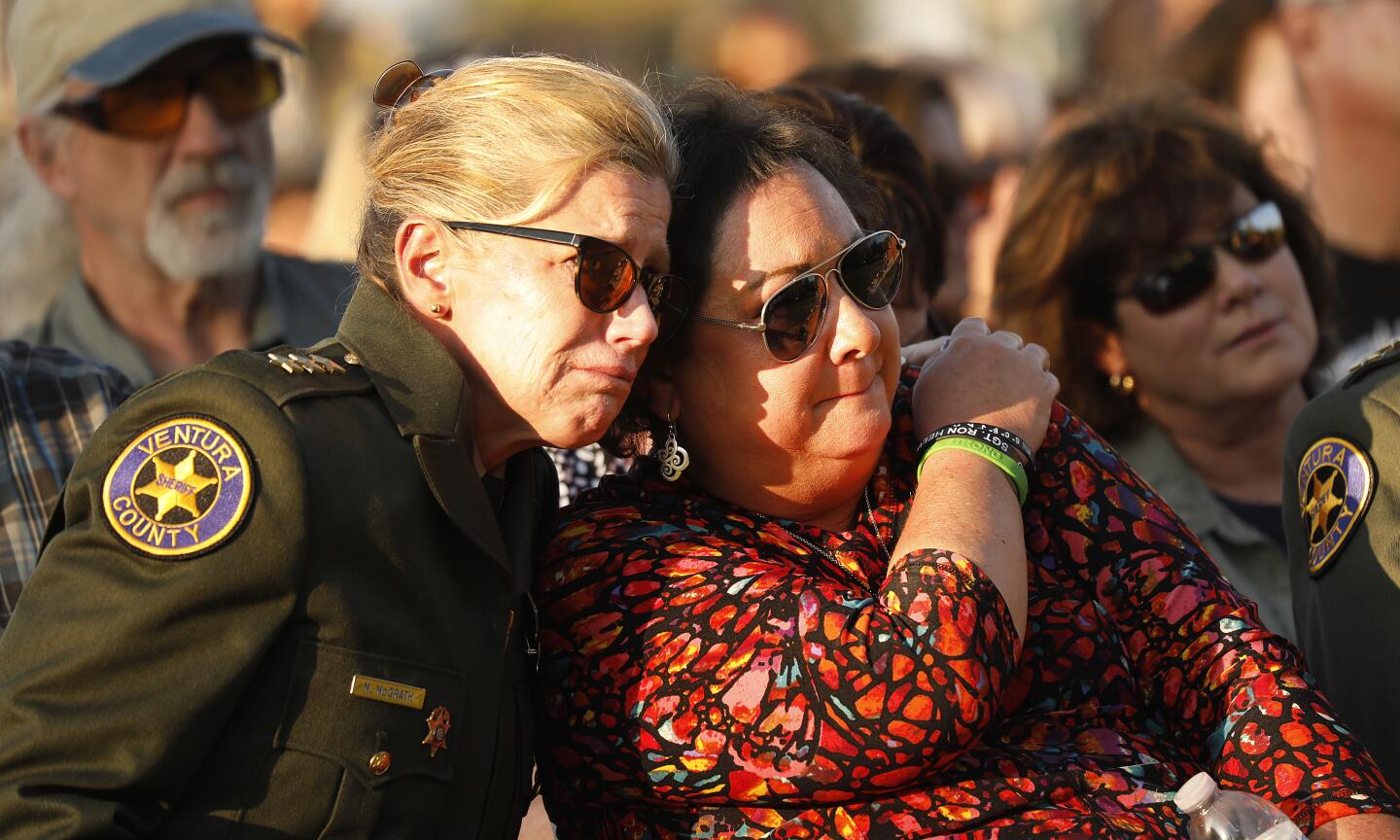 THOUSAND OAKS, CA - NOVEMBER 7, 2019 Ventura County Undersheriff Monica McGrath, left, comforts Karen Helus wife of Ventura County Sheriff Sgt Ron Helus who was killed in the Borderline mass shooting during the dedication services at the Healing Garden constructed at Conejo Creek North Park in Thousand Oaks to remember the 12 lives taken and the 248 that survived the Borderline Bar and Grill mass shooting on the one-year anniversary of the mass shooting. Brandon was best friends with victim Cody Coffman and “like a brother since they were 7 years old.” (Al Seib / Los Angeles Times)