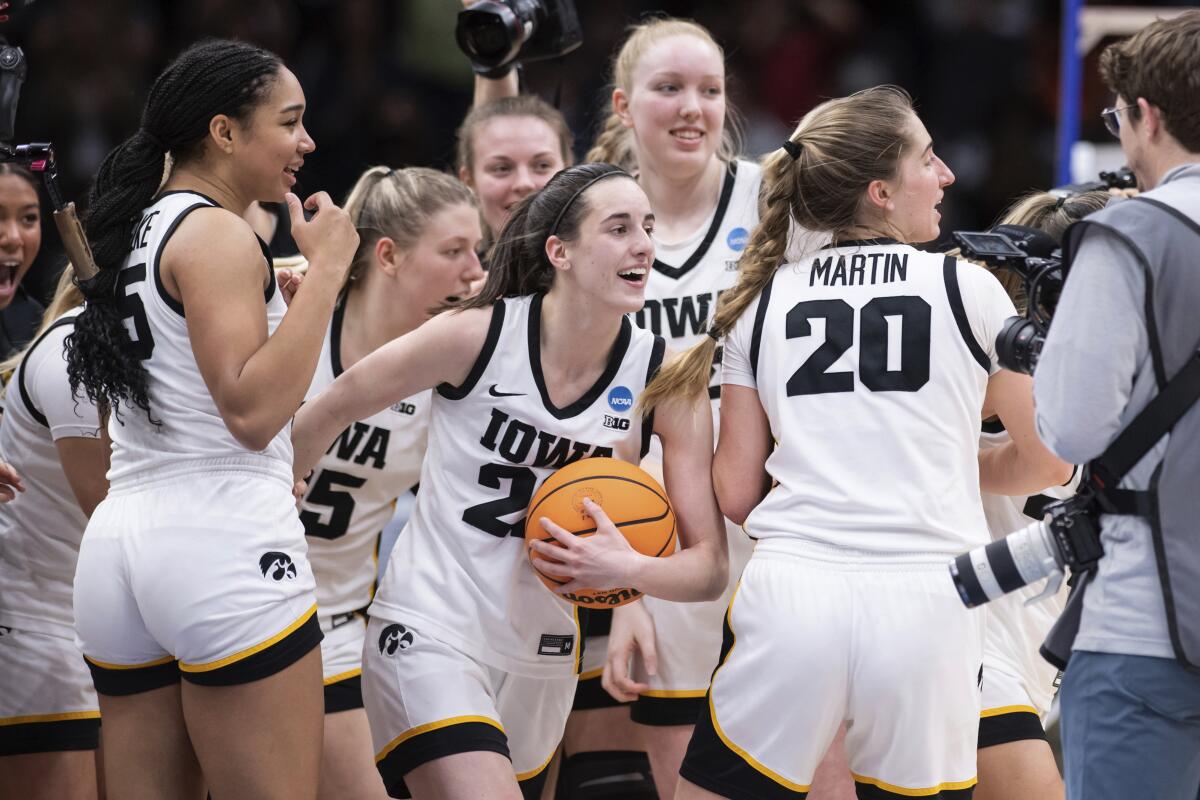 Iowa aims for the women's basketball attendance record at Kinnick in