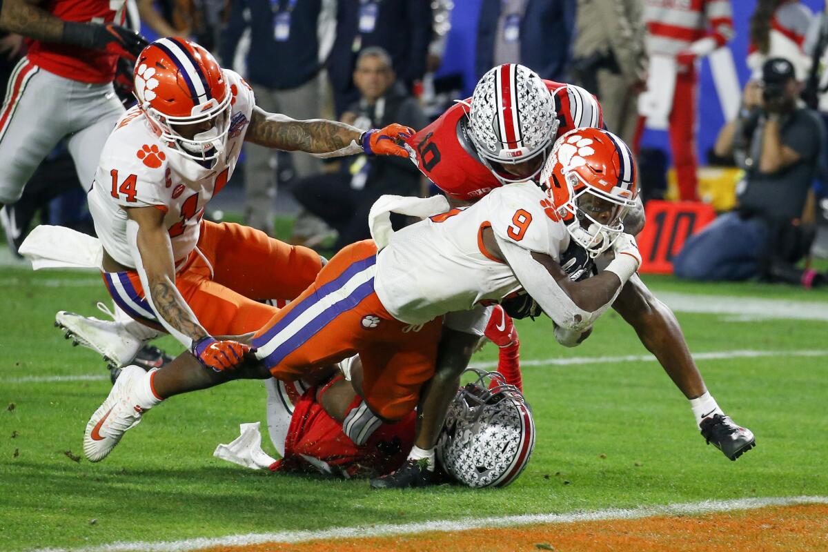 Clemson's Travis Etienne scores on a go-ahead 34-yard touchdown catch in the Fiesta Bowl on Dec. 28, 2019.