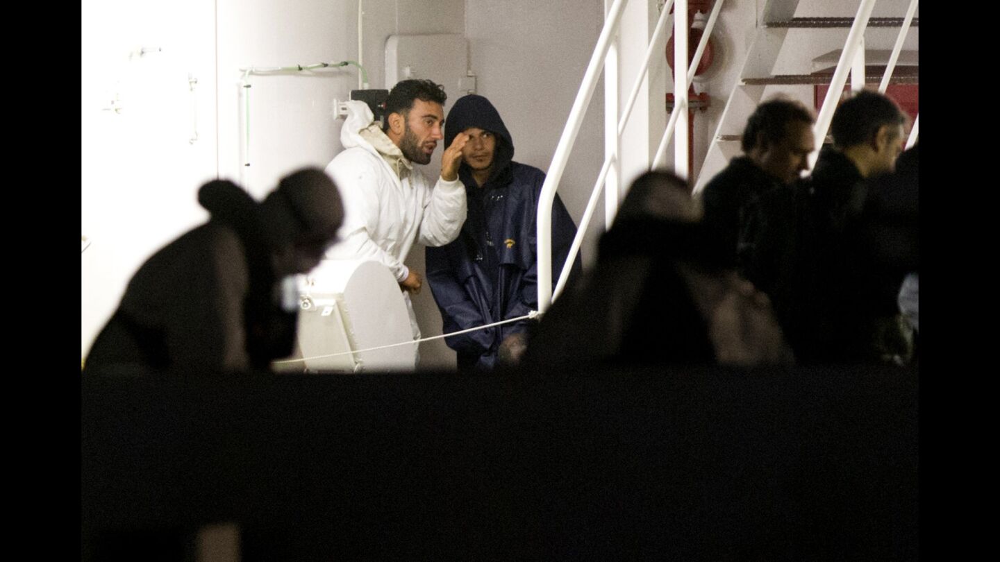 Mohammed Ali Malek, left, and Mahmud Bikhit, survivors of the boat that overturned off the coast of Libya.