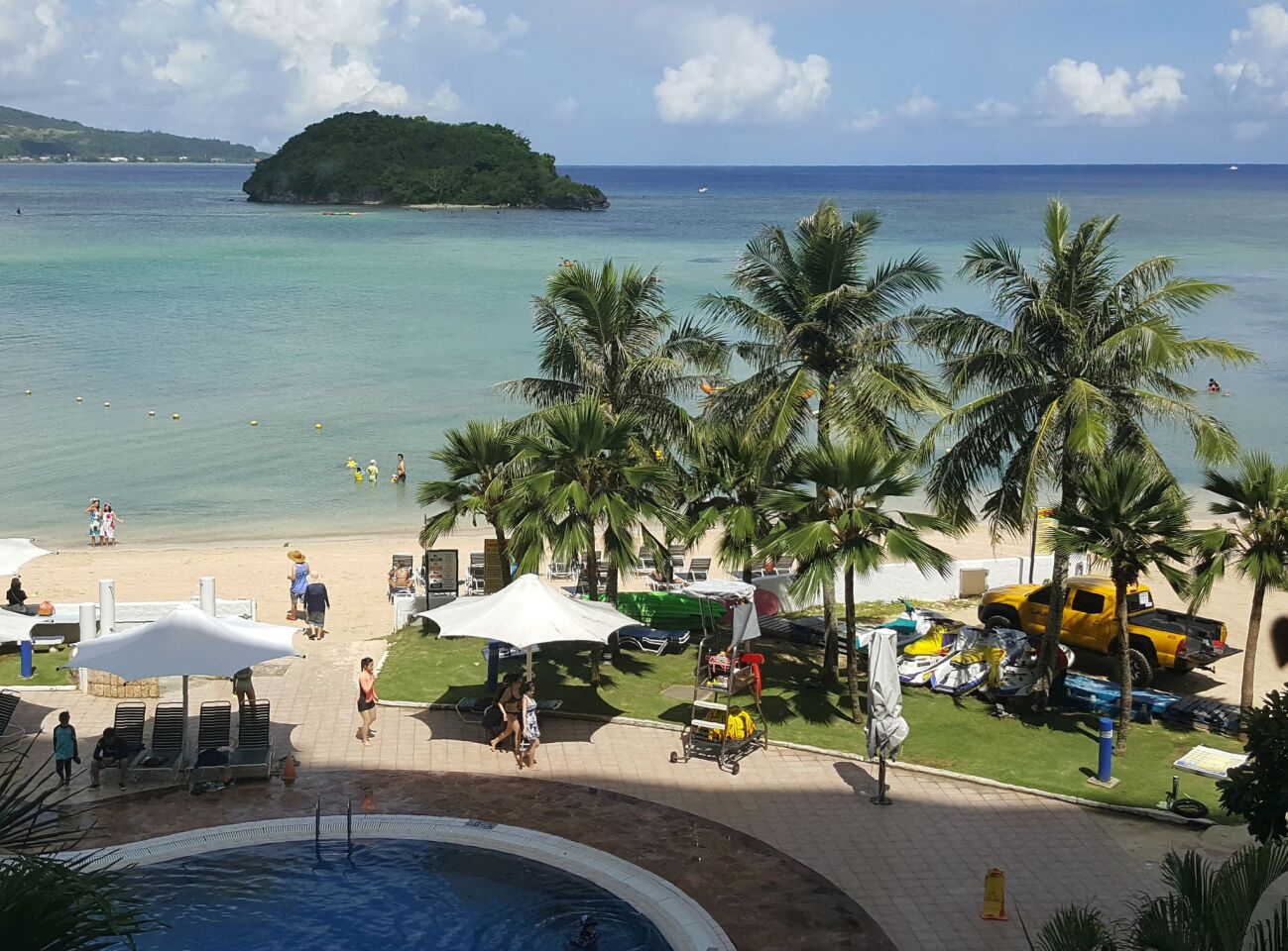 Tourists on a beach in Guam's capital Hagatna. Security and defense officials on Guam said that there is no imminent threat to people there or in the Northern Mariana Islands after North Korea said it was examining its operational plans for attack.