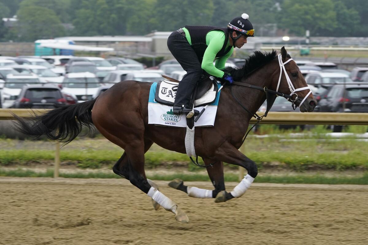 Overtook trains Thursday ahead of the 153rd running of the Belmont Stakes in Elmont, N.Y., on Saturday.