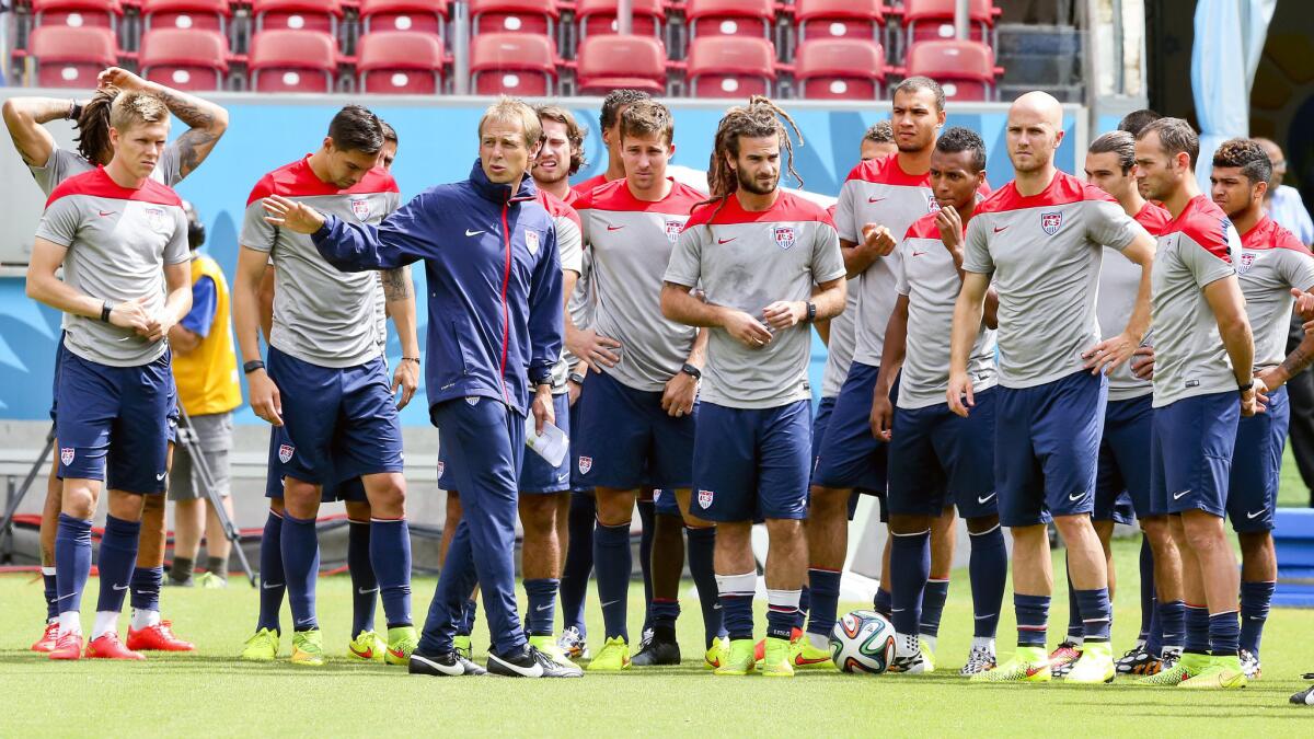 U.S. Coach Jurgen Klinsmann speaks to his players during a training session in Recife, Brazil, on Wednesday.