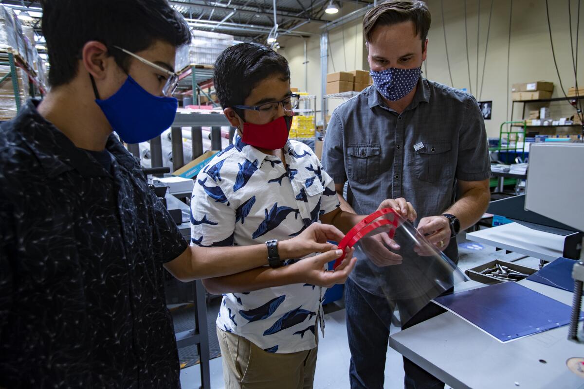 Zubin Carvalho and his brother Tenzing have made more than 12,500 face shields for frontline workers with a 3D printer.