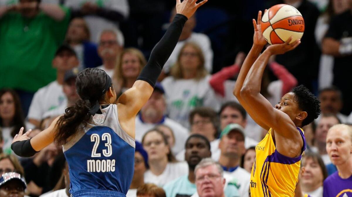 Alana Beard lines up her game-winning shot against the Lynx during Game 1 of the WNBA Finals on Oct. 9.