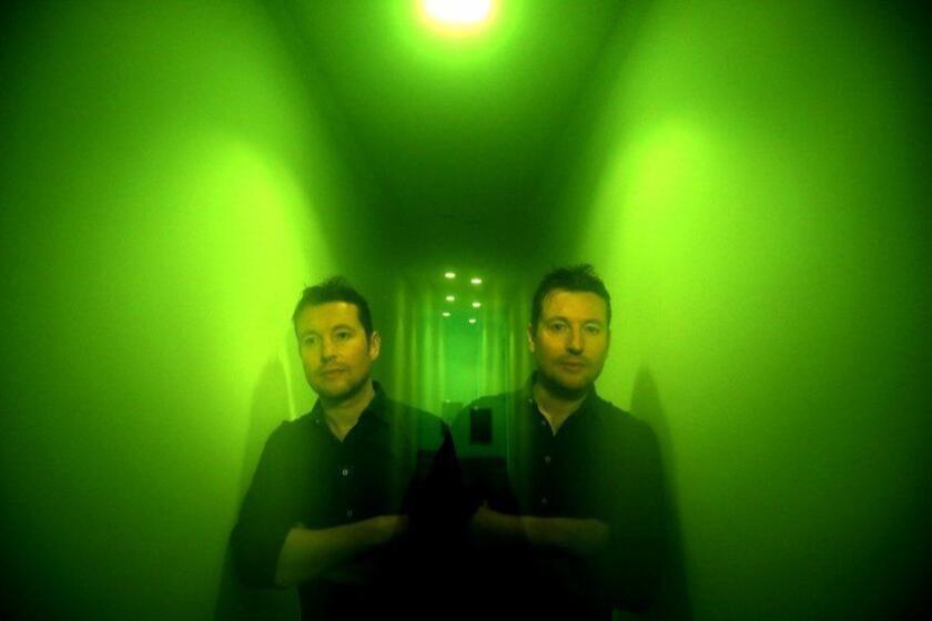 LOS ANGELES, CA â€“ MAY 23, 2018 - Filmmaker Leigh Whannell steps up his game for his new sci-fi thriller, "Upgrade," about a paraplegic man whose body is taken over by a secretive new technology that helps him exact revenge for his wife's murder. Leigh, the filmmaker behind the SAW movies, was photographed at his home in Los Angeles on May 23, 2018. (Genaro Molina/Los Angeles Times) ATT: EDITOR -- PHOTO IS A DOUBLE EXPOSURE WITH A GREEN GEL. PLEASE TRY AND MAINTAIN TONE AND COLOR. THANKS.
