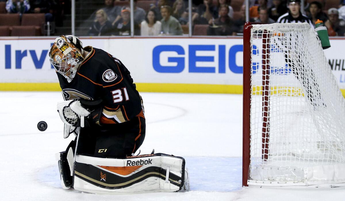 Ducks goalie Frederik Andersen blocks a shot by the Avalanche in the first period of a preseason game Monday night in Anaheim.