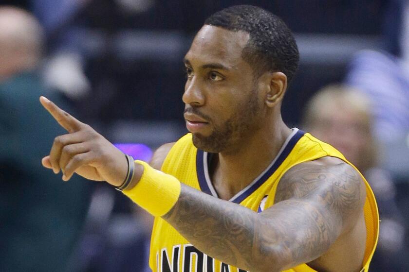 FILE - In this May 20, 2014, file photo, Indiana Pacers' Rasual Butler gestures during the NBA basketball Eastern Conference finals against the Miami Heat in Indianapolis. Authorities say Butler and his wife Leah LaBelle, whose given name is Leah LaBelle Vladowski, died in a single-vehicle rollover traffic accident in the Studio City area of Los Angeles' San Fernando Valley early Wednesday, Jan. 31, 2018. Coroner's Assistant Chief Ed Winter says both died at the scene. Autopsies are pending. (AP Photo/Michael Conroy, File)