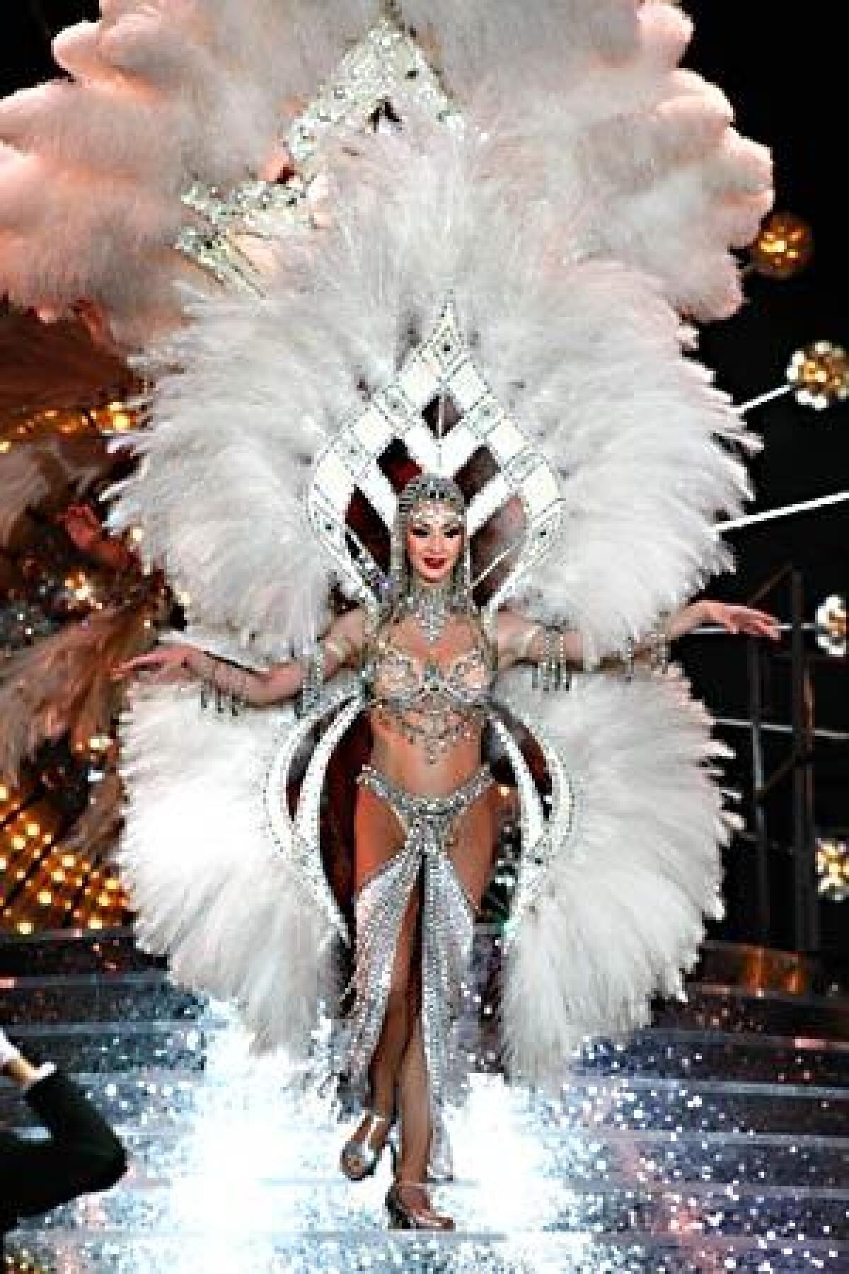 A showgirl in one of the most extravagant costumes in the finale of "Jubilee!" at Bally's.