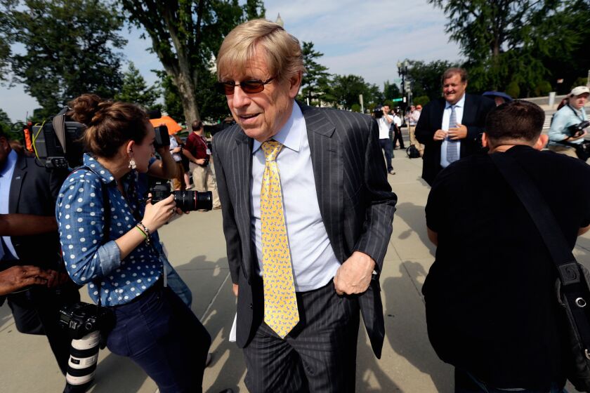 Attorney Ted Olson, seen in 2013, told ABC's "This Week" that Apple has cooperated with federal authorities but must "draw the line at re-creating code, changing the iPhone."