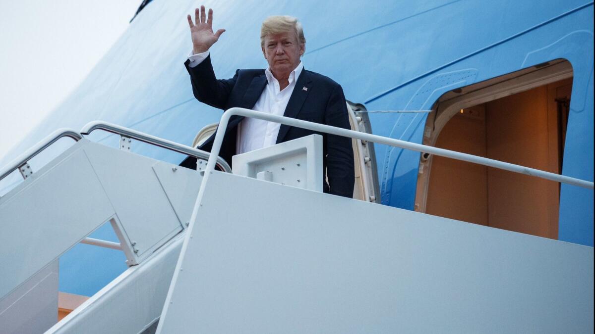 President Trump arrives Wednesday at Andrews Air Force Base after a summit with North Korean leader Kim Jong Un in Singapore.
