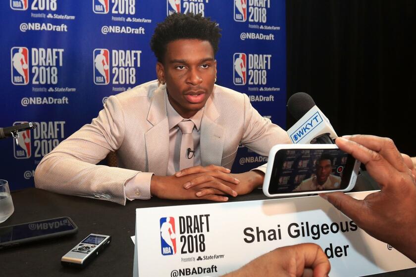NEW YORK, NY - JUNE 20: NBA Draft Prospect Shai Gilgeous-Alexander speaks to the media before the 2018 NBA Draft at the Grand Hyatt New York Grand Central Terminal on June 20, 2018 in New York City. NOTE TO USER: User expressly acknowledges and agrees that, by downloading and or using this photograph, User is consenting to the terms and conditions of the Getty Images License Agreement. (Photo by Mike Lawrie/Getty Images) ** OUTS - ELSENT, FPG, CM - OUTS * NM, PH, VA if sourced by CT, LA or MoD **