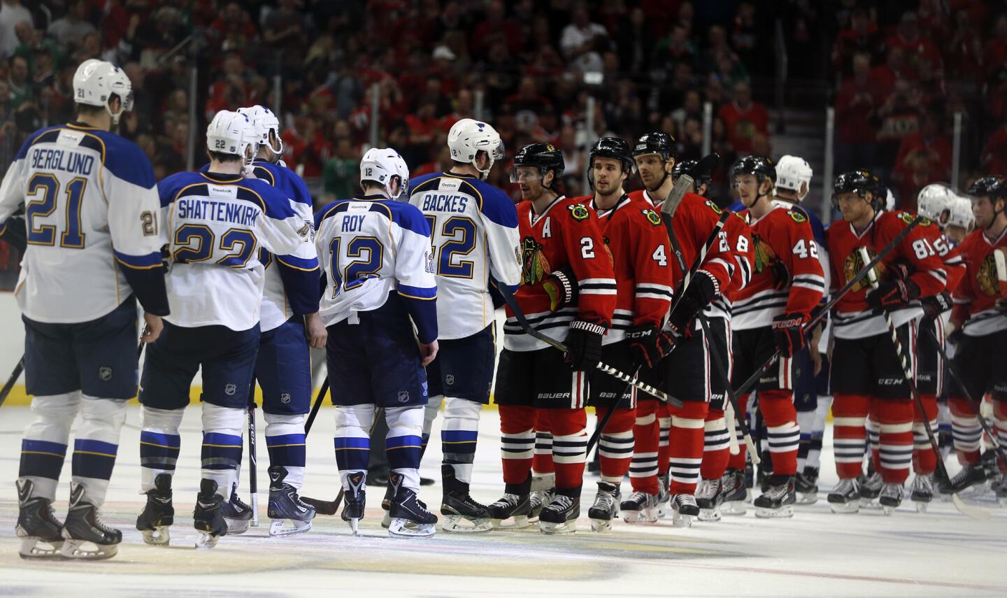 Duncan Keith shakes hands with the Blues' David Backes at the end of Game 6.
