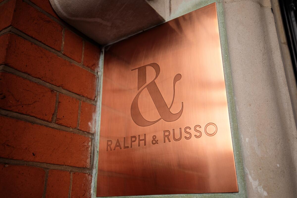 A sign for the Ralph & Russo store in Mayfair in London. The designer for Meghan Markle's wedding dress hasn't been announced ahead of her wedding to Prince Harry on Saturday. Among the speculated favorites are Erdem, Ralph & Russo and Stella McCartney.