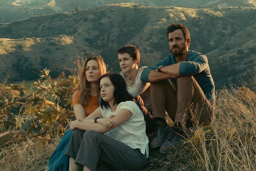 Melissa George (left), Logan Polish, Gabriel Bateman and Justin Theroux in “The Mosquito Coast.”