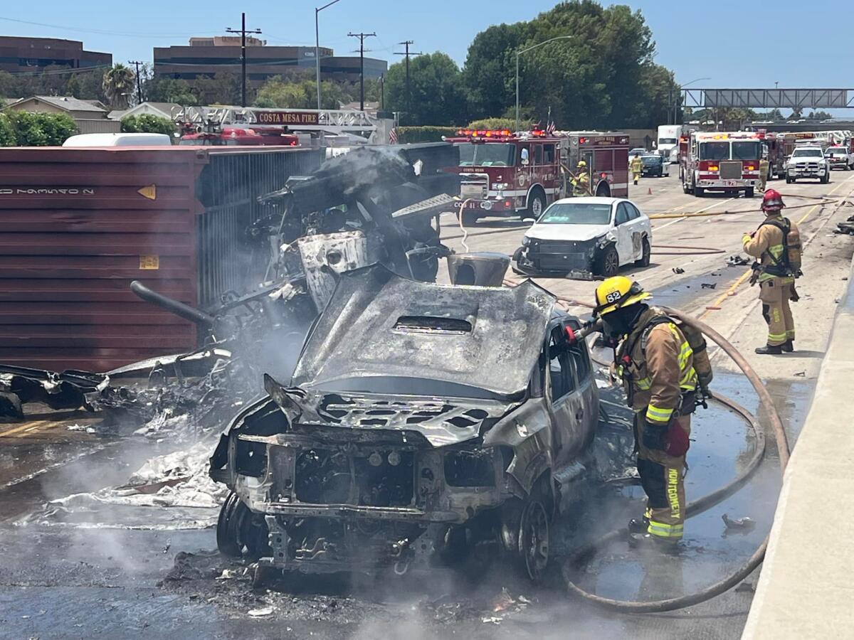 Fire crews respond to a multivehicle fire on southbound 405 Freeway Wednesday afternoon.