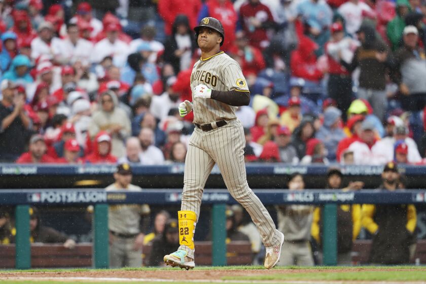 Philadelphia, PA - October 23: Juan Soto #22 of the San Diego Padres rounds the bases after hitting a solo home run during the fourth inning of NLCS Game 5 against the Philadelphia Phillies at Citizens Bank Park on Sunday, Oct. 23, 2022 in Philadelphia, PA. (Meg McLaughlin/ The San Diego Union-Tribune)