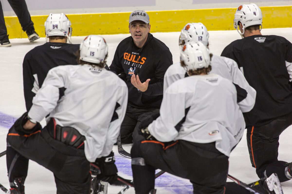 New Gulls coach Joel Bouchard talks to players during practice on Wednesday.