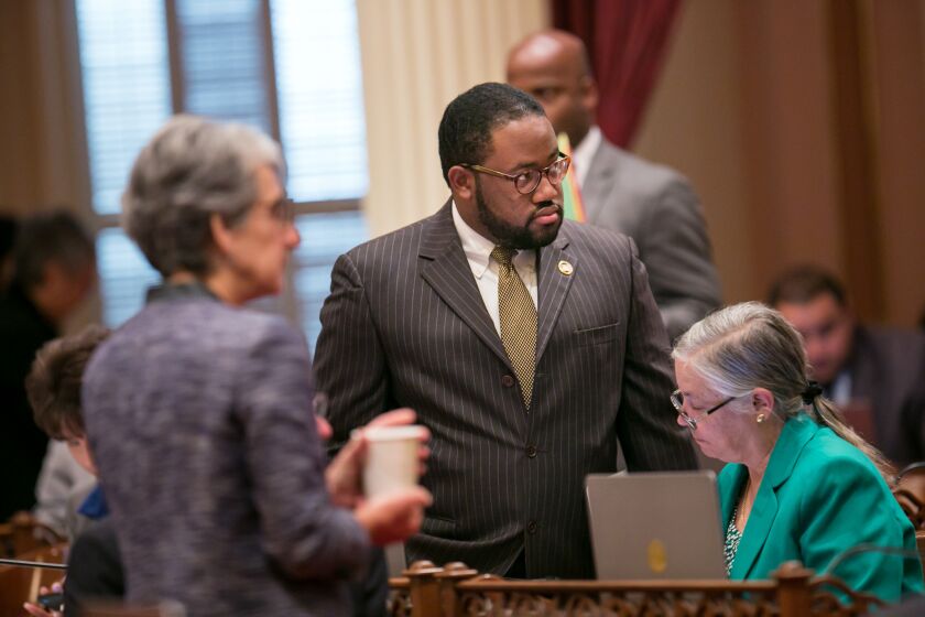 SACRAMENTO, CALIF. -- THURSDAY, JULY 9, 2015: Assemblymember Sebastian Ridleyâ€“Thomas talks to fellow lawmakers at the Statehouse Capitol, in Sacramento, Calif., on July 9, 2015. (Marcus Yam / Los Angeles Times)