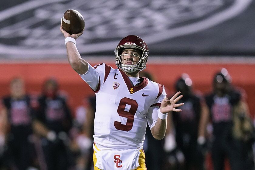 The Trojans' Kedon Slovis completed 24 of 35 passes with two touchdowns and one interception against Utah on Saturday.